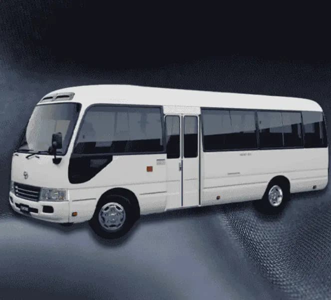 M1 Car Lift Toyota Coaster bus for corporate group transport Sharjah to Dubai